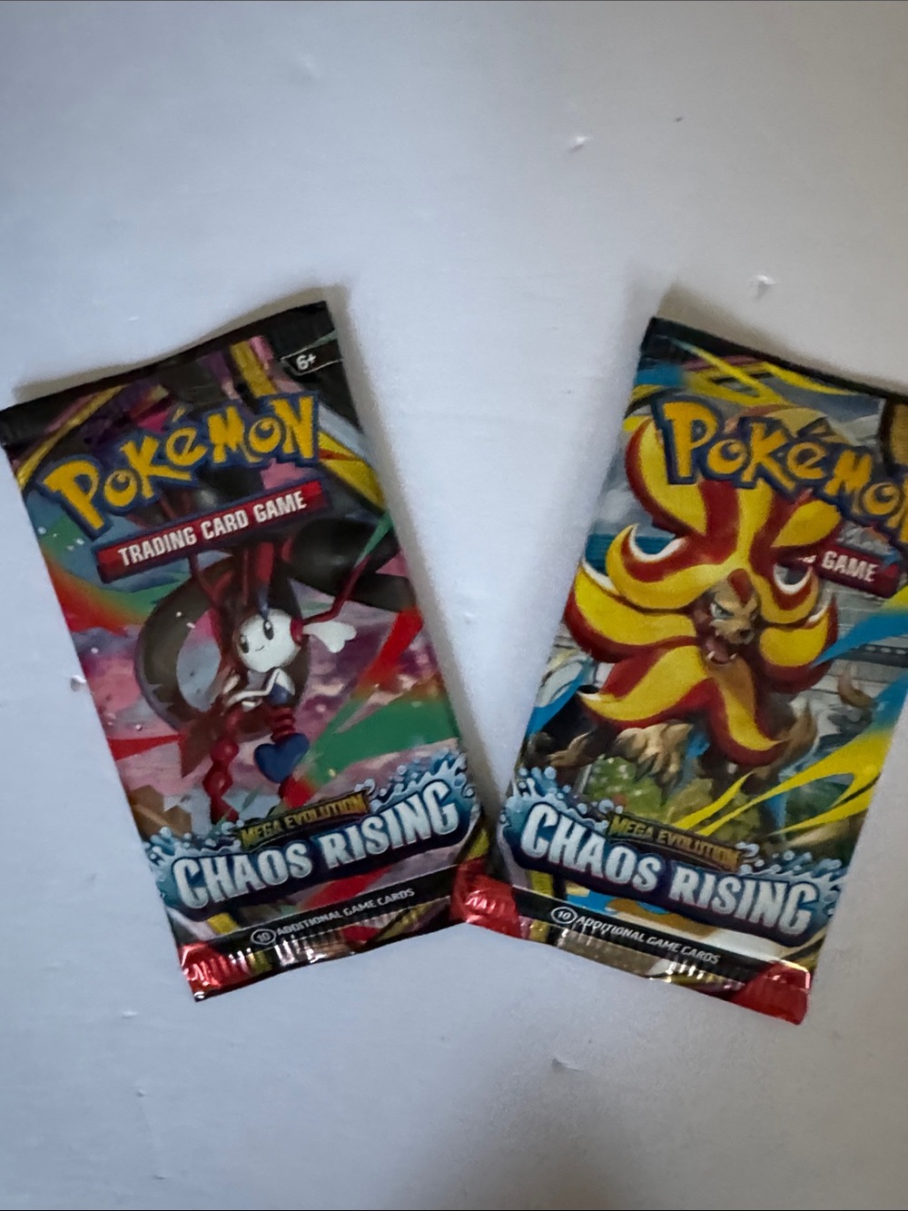 Pokemon Chaos Rising Booster Packs - Blue, Yellow, Red Artwork